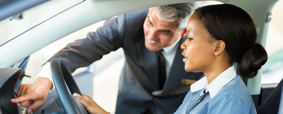 Woman-looking-at-a-car