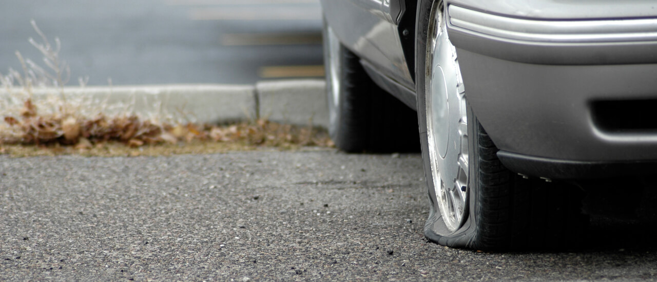 Flat Tire in Parking Lot